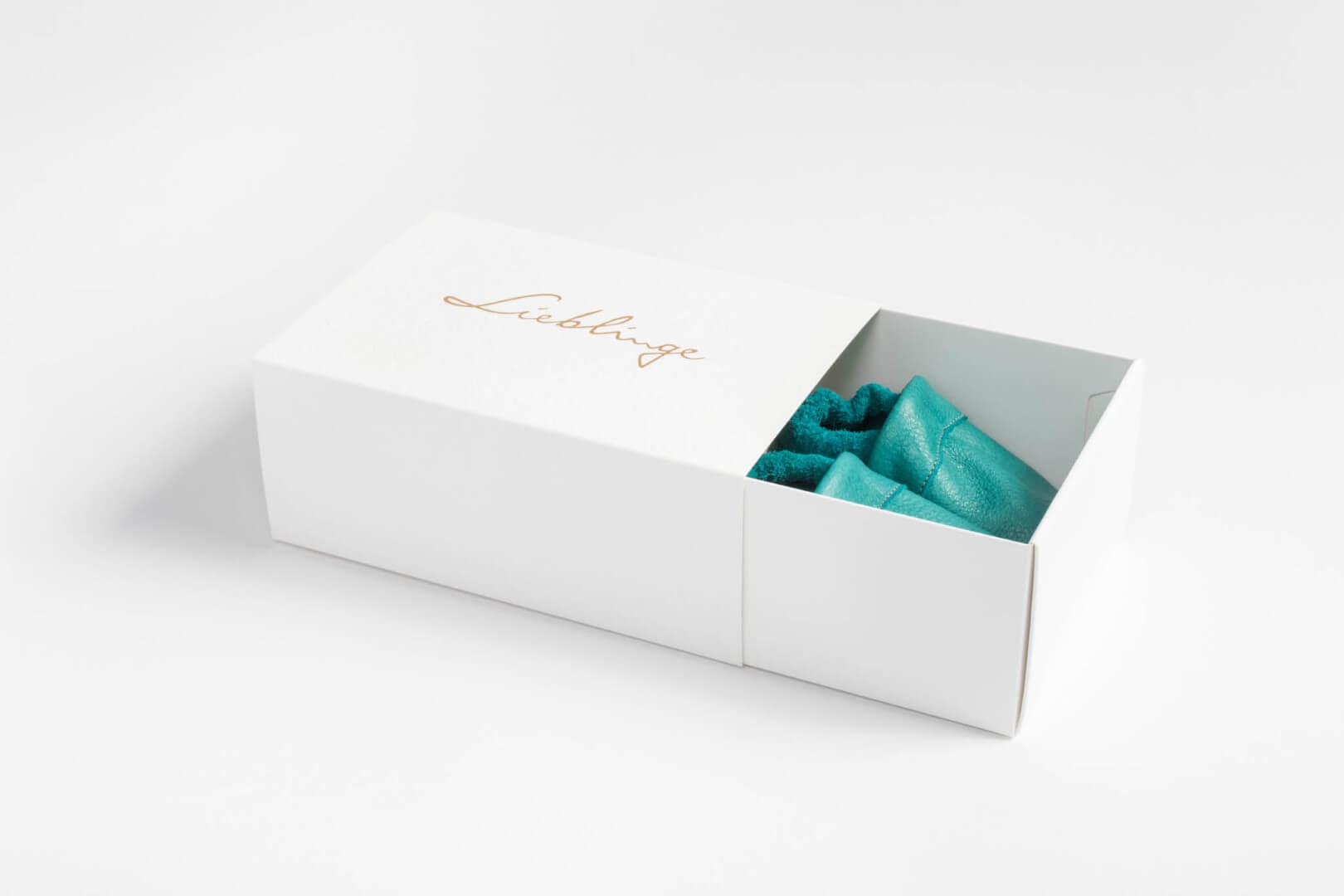 Individuell bedruckte Schiebeschachteln mit Inlay | werbegrün